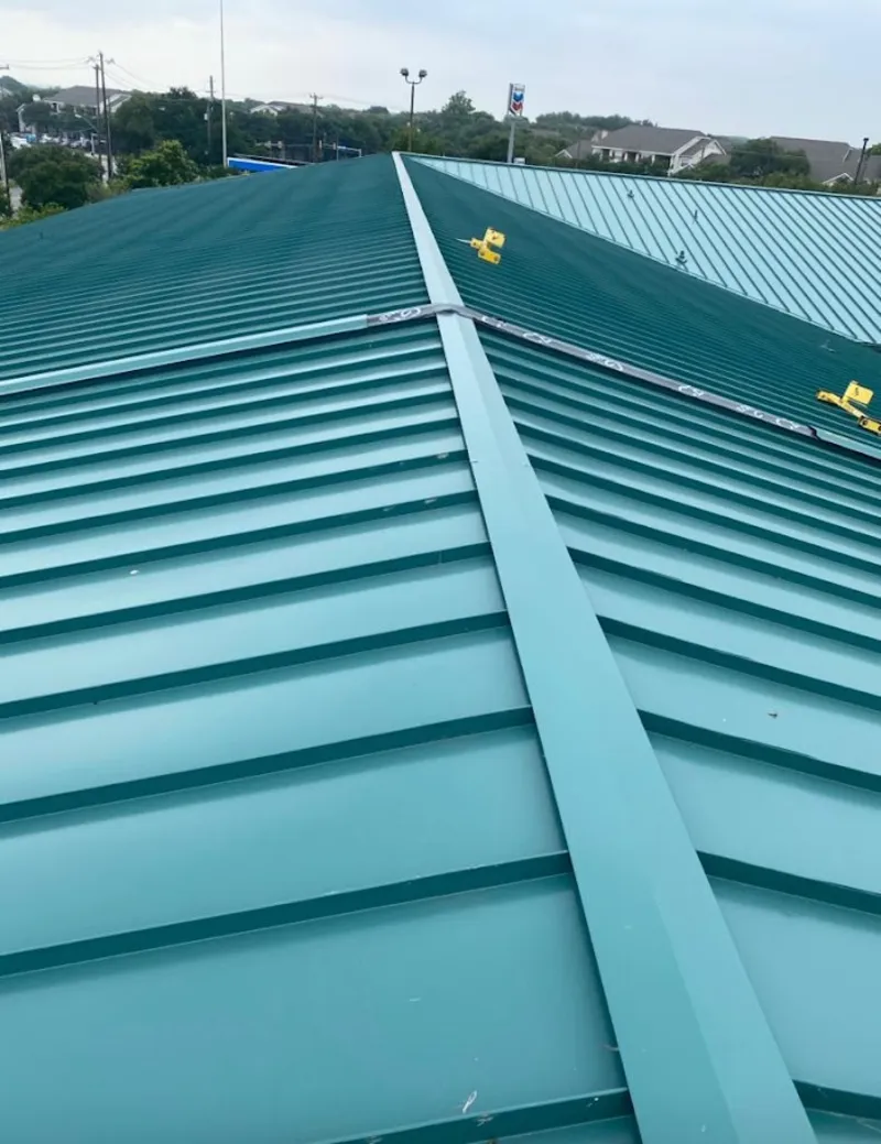 Green commercial metal roof ridge and valley for Metal Roof Repair in Frederick