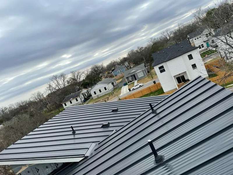 Standing seam metal roof panels with vents for Skylight Repair in Frederick